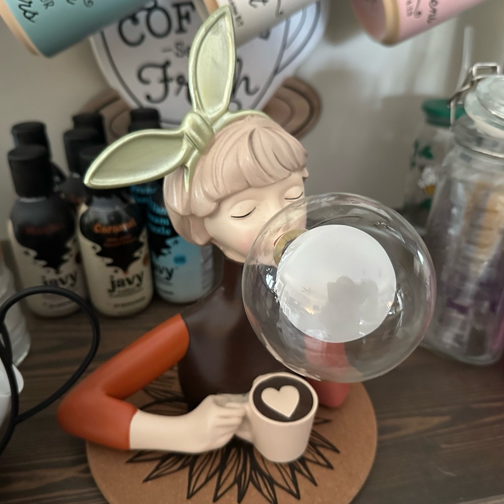 Whimsical Bubble Blowing Figurine with Coffee Cup